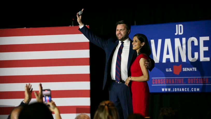 FILE —  J.D. Vance and his wife, Usha, after winning the Republican Ohio Senate primary, in Cincinnati, Ohio, on May 3, 2021. Across the country, Donald Trump has endorsed more than 200 candidates, many of whom ran unopposed or faced little-known, poorly funded opponents. (Maddie McGarvey/The New York Times)