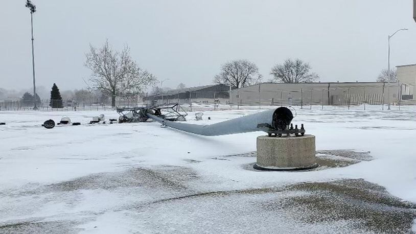 A light pole lays on the ground near Wright-Patterson Air Force Base’s flightline after it was blown over by high winds during a winter storm Dec. 23, 2022. The storm caused nearly $4 million in damage across both areas of the installation. (Contributed photo)