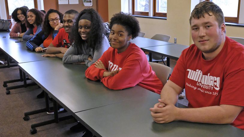 Upward Bound students and alumni gathered in Blair Hall at Wittenberg University this month to talk about the program and what they think of the federal government rejecting Upward Bound grant application because of a typing error. Bill Lackey/Staff