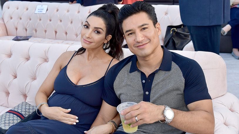 Courtney and Mario Lopez attend the 5th anniversary Los Angeles Dodgers Foundation Blue Diamond Gala at Dodger Stadium on June 12, 2019, in Los Angeles.