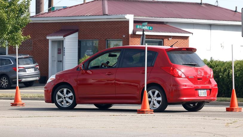 A driver goes through the maneuverability test in the parking lot of the Park Shopping Center Thursday, Sept. 21, 2023. BILL LACKEY/STAFF