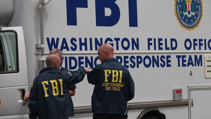 WASHINGTON, DC - AUGUST 15: The FBI's Evidence Response Team organizes during a situation. (Photo by Chip Somodevilla/Getty Images)