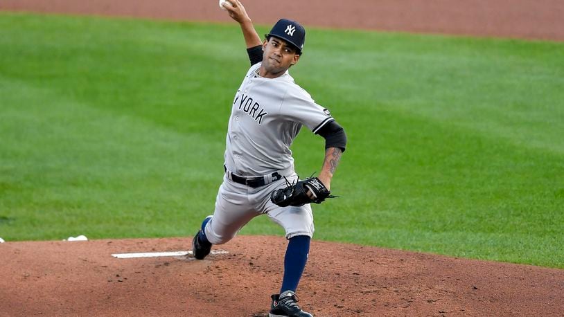 New York Yankees starting pitcher Deivi Garcia throws to a Toronto Blue Jays batter during the first inning of a baseball game in Buffalo, N.Y., Wednesday, Sept. 9, 2020. (AP Photo/Adrian Kraus)