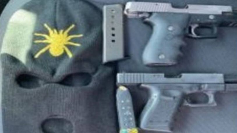 Jacksonville police recovered a ski mask and two pistols from a juvenile.