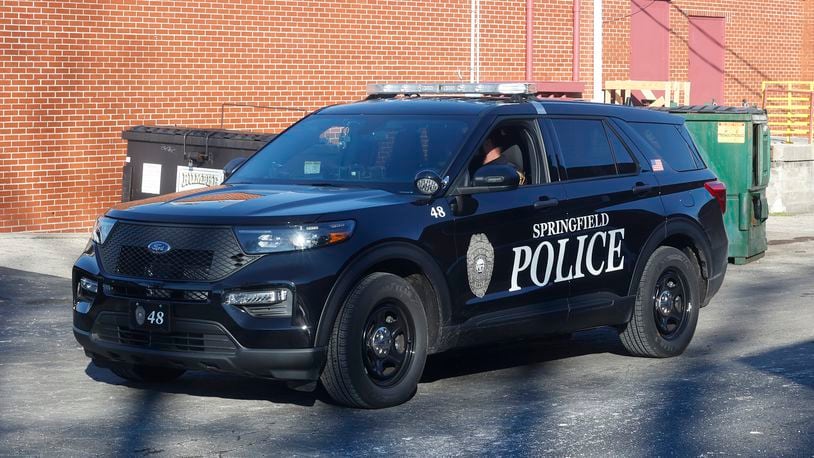 One of the Springfield Police Division's new black patrol cars at a scene Wednesday, Feb. 20, 2024. BILL LACKEY/STAFF