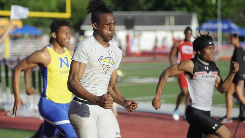 Springfield senior Quincy Scott (near) posted the best 100 finals qualifying time (10.67). The first day of the D-I regional track and field meet was at Wayne on Wed., May 23, 2018. MARC PENDLETON / STAFF