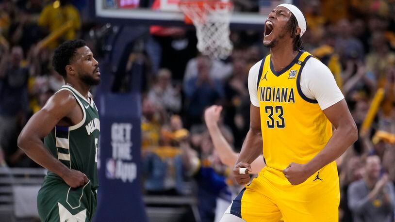 Indiana Pacers' Myles Turner reacts during the second half of Game 4 of the first round NBA playoff basketball series against the Milwaukee Bucks, Sunday, April 28, 2024, in Indianapolis. (AP Photo/Michael Conroy)