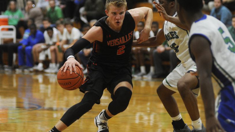 Senior Justin Ahrens of top-ranked Versailles (D-III) scored 34 points in a 68-40 win at Chaminade Julienne on Tuesday. MARC PENDLETON / STAFF