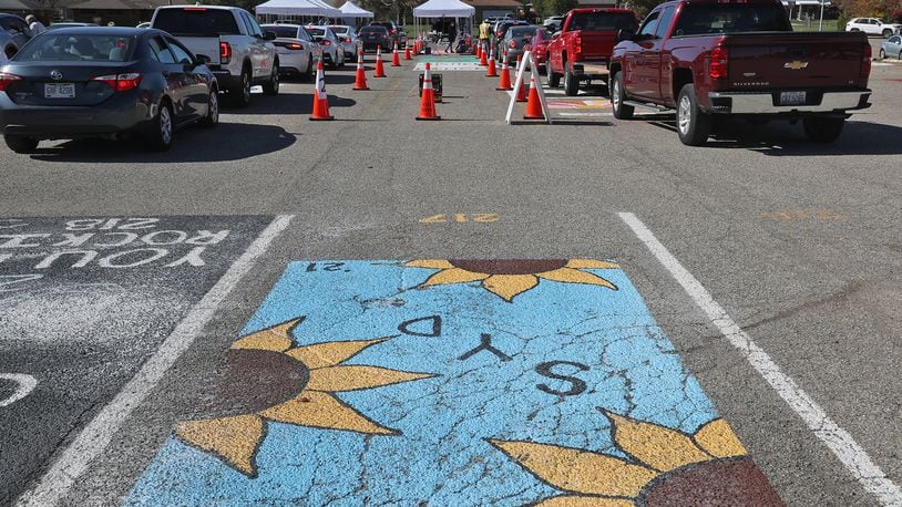 The Clark County Combined Health District held a free drive-thru COVID-19 testing clinic in the parking lot of Kenton Ridge High School on Oct. 17. BILL LACKEY/STAFF