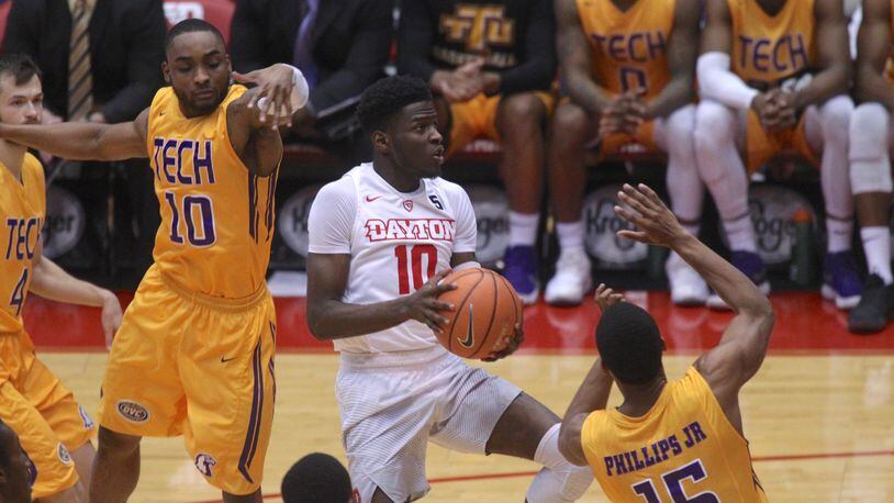 Dayton's Jalen Crutcher scores against Tennessee Tech on Wednesday, Dec. 6, 2017, at UD Arena.