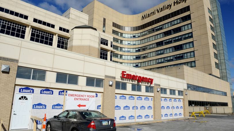 The Miami Valley Hospital Emergency Room enclosed its front canopy so it would have extra space to triage high patient volumes. MARSHALL GORBY\STAFF