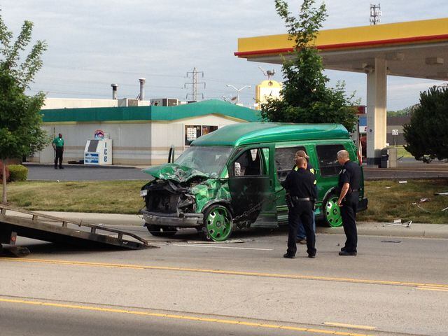 Man stabs wife and son, then crashes family van into gas pumps