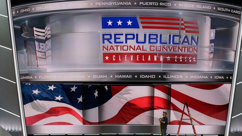 A worker stands on stage as preparations continue for the Republican National Convention, Friday, July 15, 2016, at the Quicken Loans Arena in Cleveland. (AP Photo/Alex Brandon)