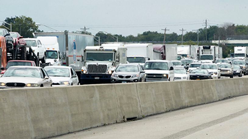 Interstate 75 was shut down in the northbound lanes between Ohio 63 and Ohio 122 due to a shooting incident Friday, Sept. 12, 2014. GREG LYNCH / STAFF