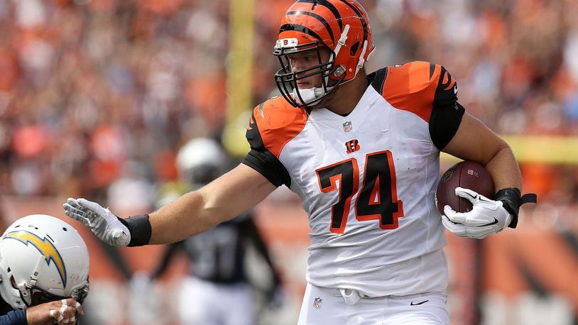 No, Jake Fisher is not expected to carry the ball or stiff-arm any defenders this season, but the Bengals will be looking for the right tackle and his linemates to improve their collective push. Here, Fisher was trying to evade former Chargers safety Eric Weddle after scooping up a fumble in his rookie season of 2015.
