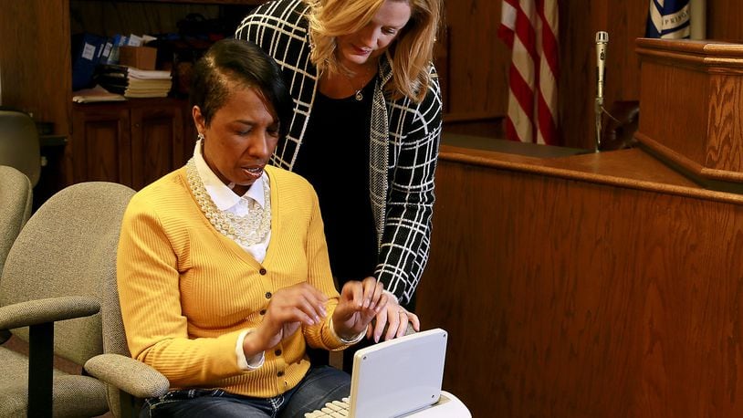 Clark State College and Stark State College, in North Canton, Ohio, will offer a free virtual orientation for the online Judicial Court Reporting associate degree program. This is Instructor Robyn Hennigan with a Clark State student last year showing her how to use a stenographers machine for court reporting. Bill Lackey/Staff