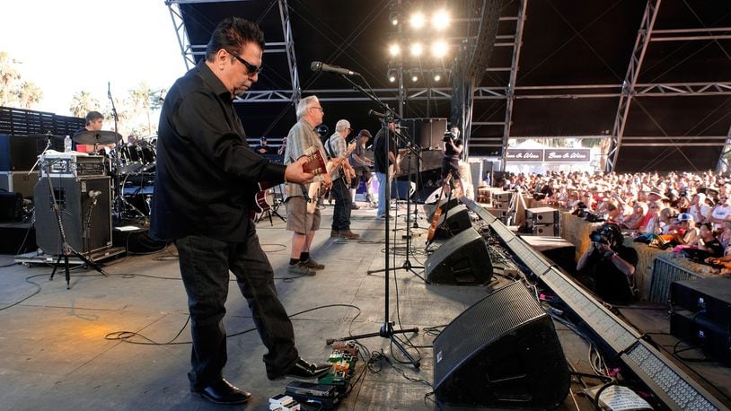 (L-R) Musicians Enrique Gonzalez, Cesar Rosas,  Conrad Lozano, Louie Perez, Steve Berlin, and David Hidalgo of Los Lobos perform at 2017 Stagecoach California's Country Music Festival. The band will be playing this summer with Emmylou Harris at the Rose Music Center in Dayton and the ICON Music Center in Cincinnati.  (Photo by Frazer Harrison/Getty Images for Stagecoach)