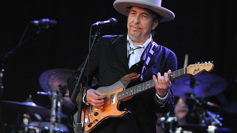 US legend Bob Dylan performs on stage during the 21st edition of the Vieilles Charrues music festival on July 22, 2012 in Carhaix-Plouguer, western France.  AFP PHOTO / FRED TANNEAU        (Photo credit should read FRED TANNEAU/AFP/GettyImages)