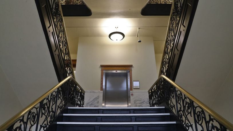 The grand staircase in the newly renovated A.B. Graham Building with a new elevator. BILL LACKEY/STAFF