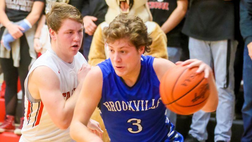 Brookville guard Dalton Stewart (3) drives to the basket during their game at Franklin, Tuesday, Feb. 7, 2017. GREG LYNCH / STAFF