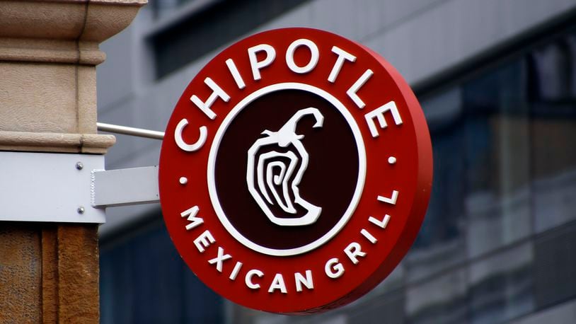 FILE - A sign for the Chipotle restaurant in Pittsburgh's Market Square is pictured Feb. 8, 2016. Last week, the Newport Beach, California-based Mexican chain asked its U.S. and Canadian employees to temporarily select another protein option for their meals to preserve its supply of chicken. But the chain said Thursday, April 25, 2024, that employees can go back to eating chicken again. (AP Photo/Keith Srakocic, File)