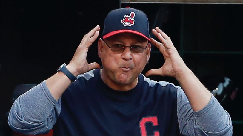 CLEVELAND, OH - JULY 09: Manager Terry Francona #77 of the Cleveland Indians requests a review of a play against the Cincinnati Reds during the third inning at Progressive Field on July 9, 2018 in Cleveland, Ohio. The Reds defeated the Indians 7-5. (Photo by Ron Schwane/Getty Images)