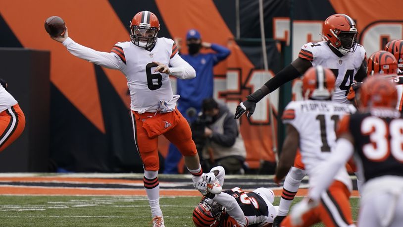 Cleveland Browns quarterback Baker Mayfield (6) throws during the second half of an NFL football game against the Cincinnati Bengals, Sunday, Oct. 25, 2020, in Cincinnati. (AP Photo/Bryan Woolston)