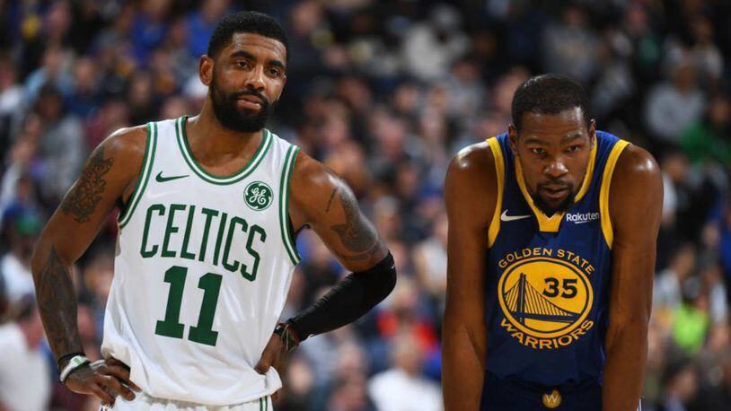 Kyrie Irving, left, and Kevin Durant will now play for the same team after agreeing to deals with the Brooklyn Nets.