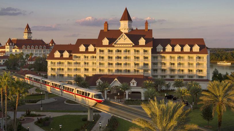 FILE PHOTO: A Monorail drives by The Grand Floridian Resort at Walt Disney World. A door became unhinged on a Monorail cars after a person on a motorized scooter hit the door Tuesday.