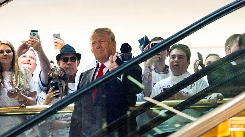 NEW YORK, NY - JUNE 16: Business mogul Donald Trump rides an escalator to a press event to announce his candidacy for the U.S. presidency at Trump Tower on June 16, 2015 in New York City. Trump is the 12th Republican who has announced running for the White House. (Photo by Christopher Gregory/Getty Images)