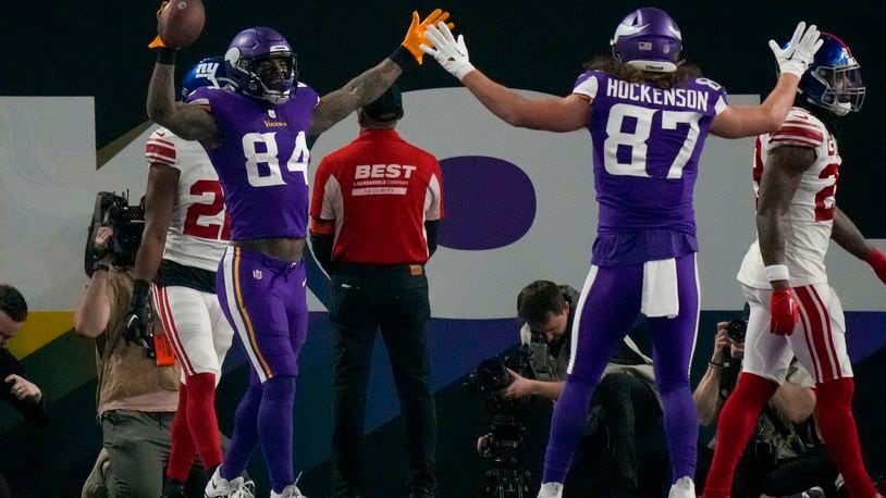 Minnesota Vikings' Irv Smith Jr. celebrates after catching a touchdown pass during the second half of an NFL wild card football game Sunday, Jan. 15, 2023, in Minneapolis. (AP Photo/Charlie Neibergall)