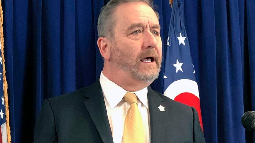 FILE - Ohio Attorney General Dave Yost speaks in Columbus, Ohio on Feb. 20, 2020.  Yost says, Friday, Jan. 7, 2022 he hopes everyone receives the coronavirus vaccine, but it should be a person's choice, not the result of a government mandate.  (AP Photo/Julie Carr Smyth, File)
