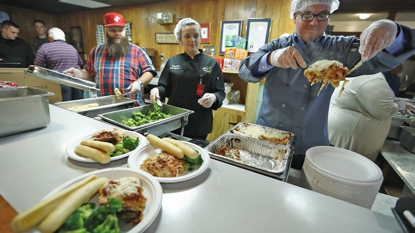 The staff from Olive Garden usually serves up an Italian Thanksgiving feast at the Springfield Soup Kitchen on Thanksgiving, but this year the kitchen will be closed for the holiday because of COVID-19. Bill Lackey/Staff
