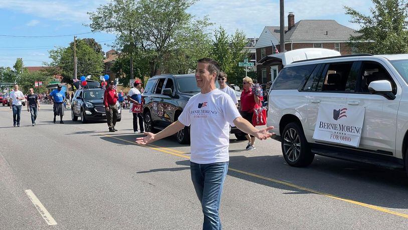 Cleveland businessman Bernie Moreno announced on Thursday Feb. 4, 2022 that he is dropping his Republican primary bid for the U.S. Senate seat now held by U.S. Sen. Rob Portman, R-Ohio. He's pictured here walking in the July 4 parade in Parma, Ohio. PROVIDED/BERNIE MORENO CAMPAIGN