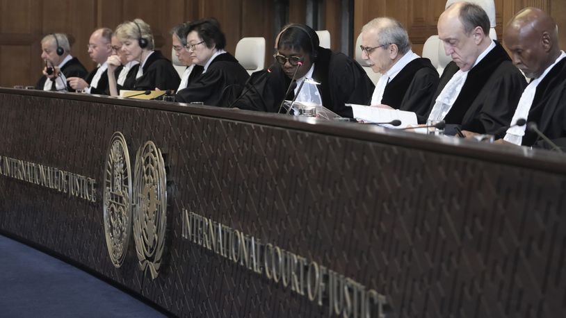 Judge Nawaf Salam, third right, speaks at the start of a two days hearing at the World Court in The Hague, Netherlands, Monday, April 8, 2024, in a case brought by Nicaragua accusing Germany of breaching the genocide convention by providing arms and support to Israel. (AP Photo/Patrick Post)