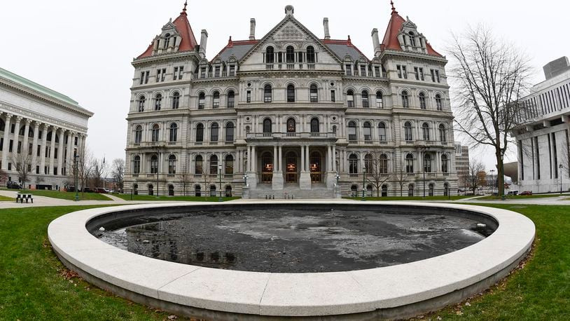 FILE - The New York Capitol is seen, Dec. 14, 2020, in Albany, N.Y. New York Gov. Kathy Hochul, on Monday, April 15, 2024, announced the framework of a $237 billion budget that includes broad plans to to drive new housing construction, address the influx of migrants and crack down on illegal marijuana shops. (AP Photo/Hans Pennink, File)