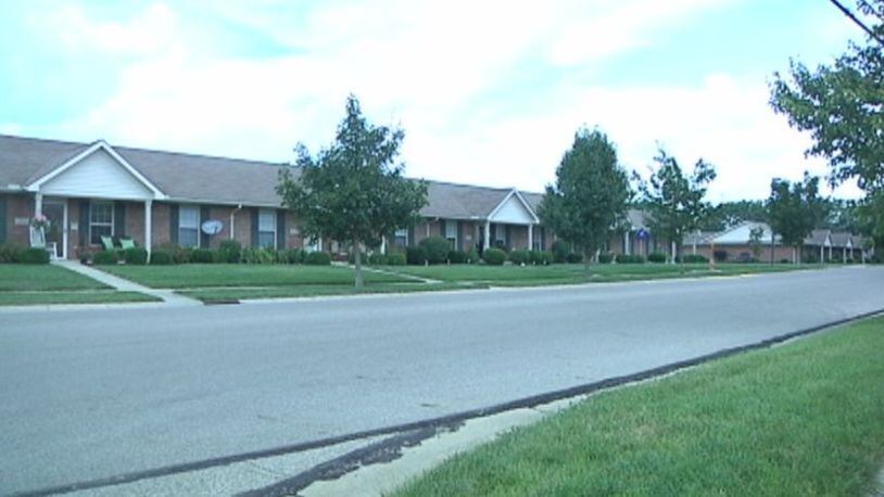 Residents along in the Westmont Drive neighborhood report a man knocking on their door late at night claiming he is with a utility company.