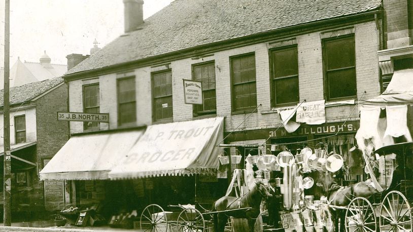This photo from around May of 1890 shows businesses on the west side of what was still called S. Market near the corner of High Street, not long before the grand esplanade fountain, which had been dedicated the previous summer, altered the name of the street to South Fountain. Shown are Cyrus McColloughâs bargain notion shop, two groceries, those of J.B. North and A.P. Trout, and an advertisement for the upcoming performance featuring stage star Maggie Mitchell at the Grand Opera House. PHOTO COURTESY OF THE CLARK COUNTY HISTORICAL SOCIETY