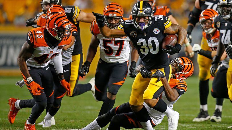 PITTSBURGH, PA - OCTOBER 22: James Conner #30 of the Pittsburgh Steelers carries the ball against the Cincinnati Bengals in the fourth quarter during the game at Heinz Field on October 22, 2017 in Pittsburgh, Pennsylvania. (Photo by Justin K. Aller/Getty Images)