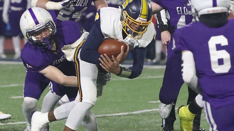 Springfield’s Te’Sean Smoot on a quarterback keeper against Elder in the Division I state semifinals on Nov. 29, 2019, at Piqua. BILL LACKEY/STAFF