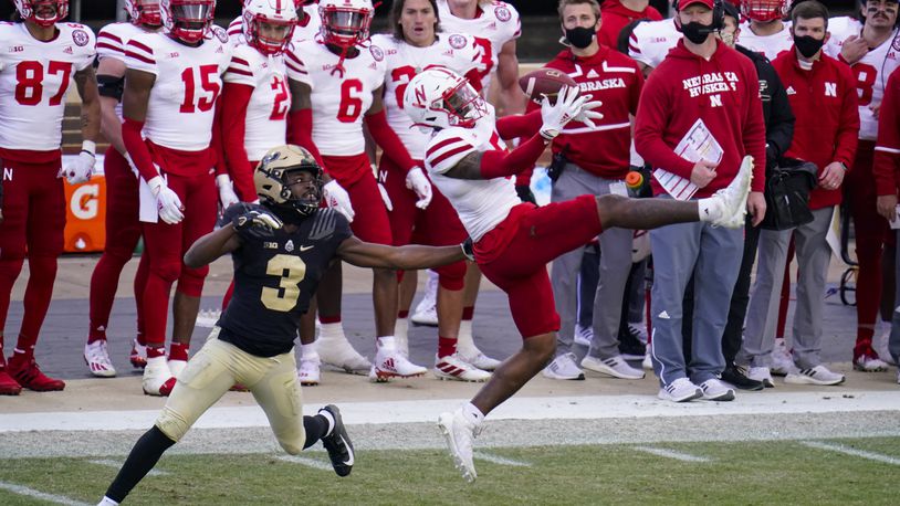 Nebraska cornerback Cam Taylor-Britt (5) breaks up a pass intended for Purdue wide receiver David Bell (3) during the fourth quarter of an NCAA college football game in West Lafayette, Ind., Saturday, Dec. 5, 2020.  (AP Photo/Michael Conroy)