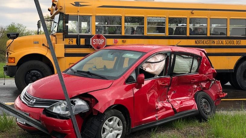 A Northeastern Local Schools District bus was involved in a two-vehicle crash involving a small car at east U.S. 40 and I-70 in Harmony Twp., Clark County, on Wednesday, May 9, 2018. BILL LACKEY / STAFF