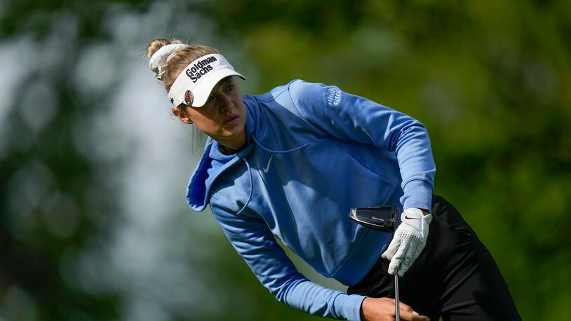 Nelly Korda looks after her shot off the 13th tee during the first round of the LPGA Cognizant Founders Cup golf tournament, Thursday, May 9, 2024, in Clifton, N.J. (AP Photo/Seth Wenig)