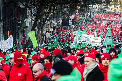 Tens of thousands of workers join a demonstration to protest against austerity measures that have affected their income during the financial crisis and demand labor-boosting initiatives, in Brussels.