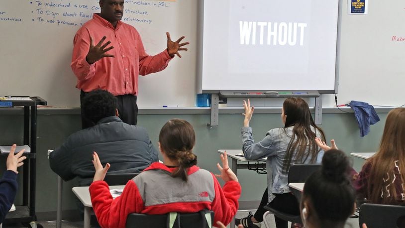 Springfield teacher Arlon Nash teaches American Sign Language to students at Springfield High School. BILL LACKEY/STAFF