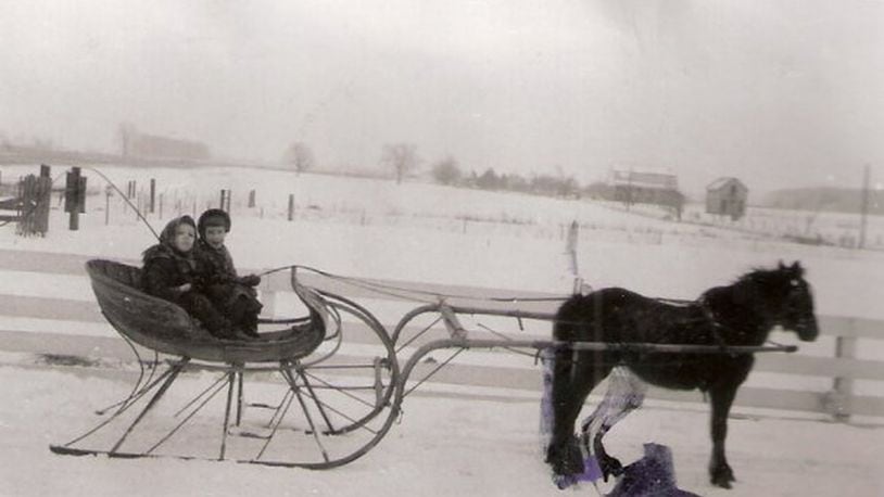 Pam Cottrel and best friend Bethy Phillips riding in a one-pony sleigh. CONTRIBUTED