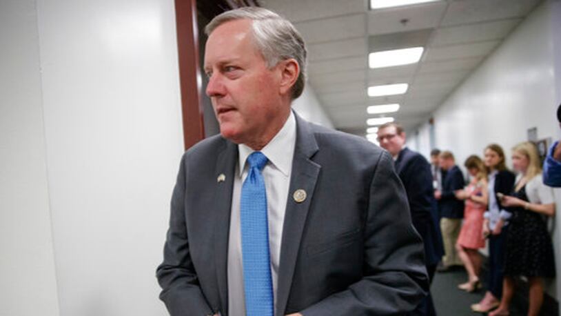 House Freedom Caucus Chairman Rep. Mark Meadows, R-N.C., whose conservative GOP members derailed the Republican health care bill, leaves a closed-door strategy session with Speaker of the House Paul Ryan, R-Wis., and the leadership as they try to rebuild unity within the Republican Conference, at the Capitol, in Washington, Tuesday, March 28, 2017. (AP Photo/J. Scott Applewhite)