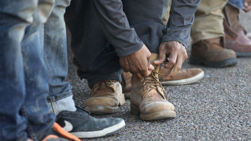 File photo of someone tying a shoe