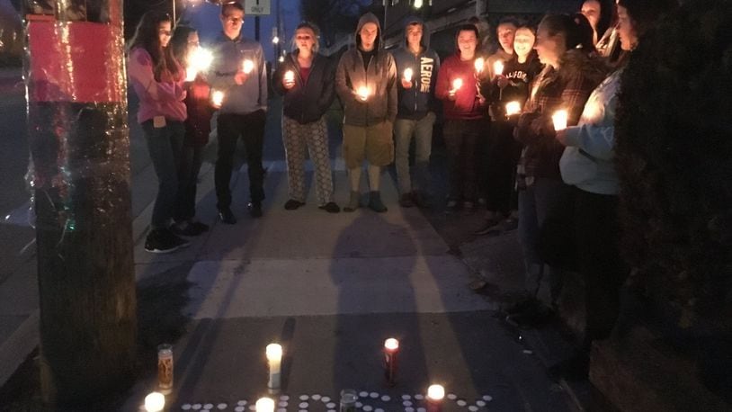 Friends and family of Springfield shooting victim Lindsey Marsh held a vigil Sunday night in Springfield. Marsh died from injuries sustained in a shooting. She was 30 weeks pregnant, but doctors were able to save her child. STAFF