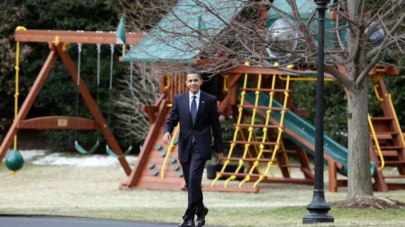 U.S. President Barack Obama walks past a new swing set as he departs the White House for Marine One on March 6, 2009 in Washington, DC.